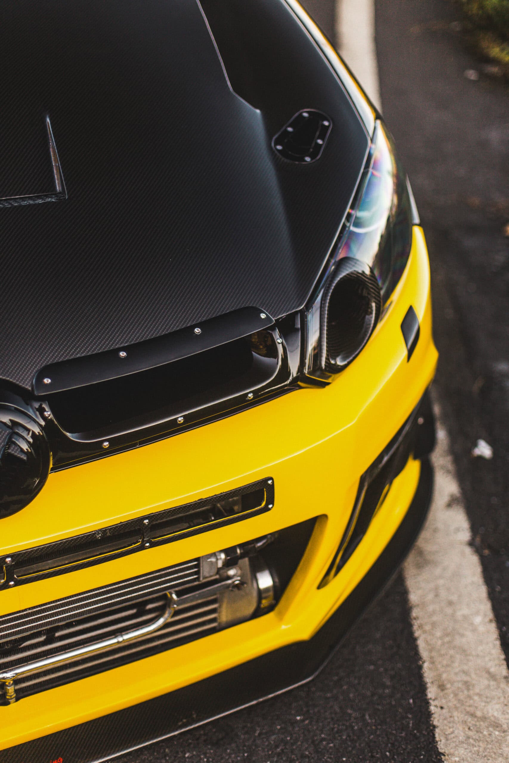front-xenon-lights-yellow-black-car-top-view